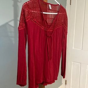 Cranberry long sleeve top with pretty details.